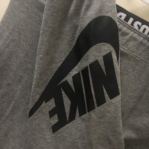 Grey Nike leggings.